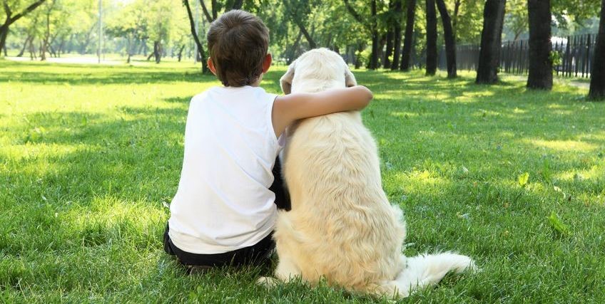 Boy_on_grass_with_dog Boy with dog on grass